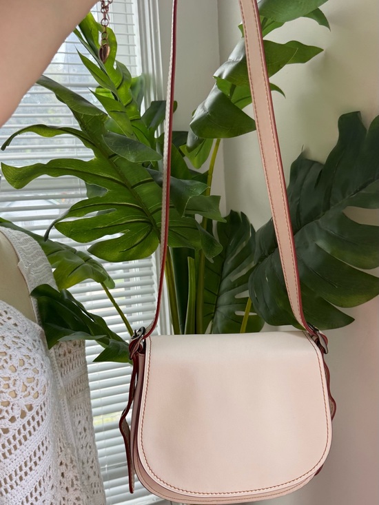 Coach Handbags - Coach Cream and Brown Crossbody Saddle Bag